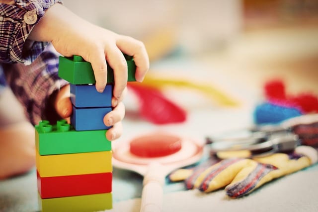 Children playing with building blocks during after-school care